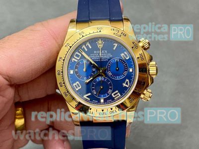 Swiss Replica Rolex Cosmo Daytona 904L Gold Case Blue Rubber Strap